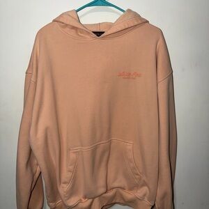 Peach Hoodie with White Fox logo